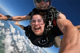 All smiles from a tandem student in freefall